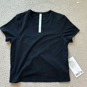 Lululemon size 4 Black Cotton blend tee